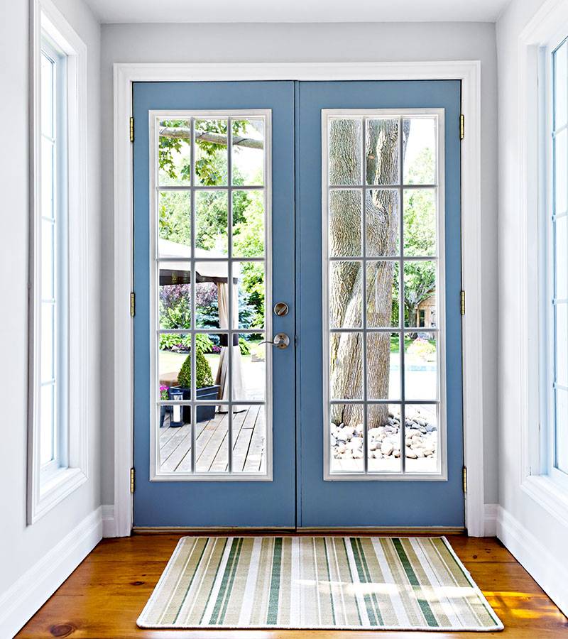 sky blue front door with window details