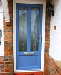 Blue front door with long window details